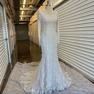 Long sleeve lace wedding gown fit and flare
